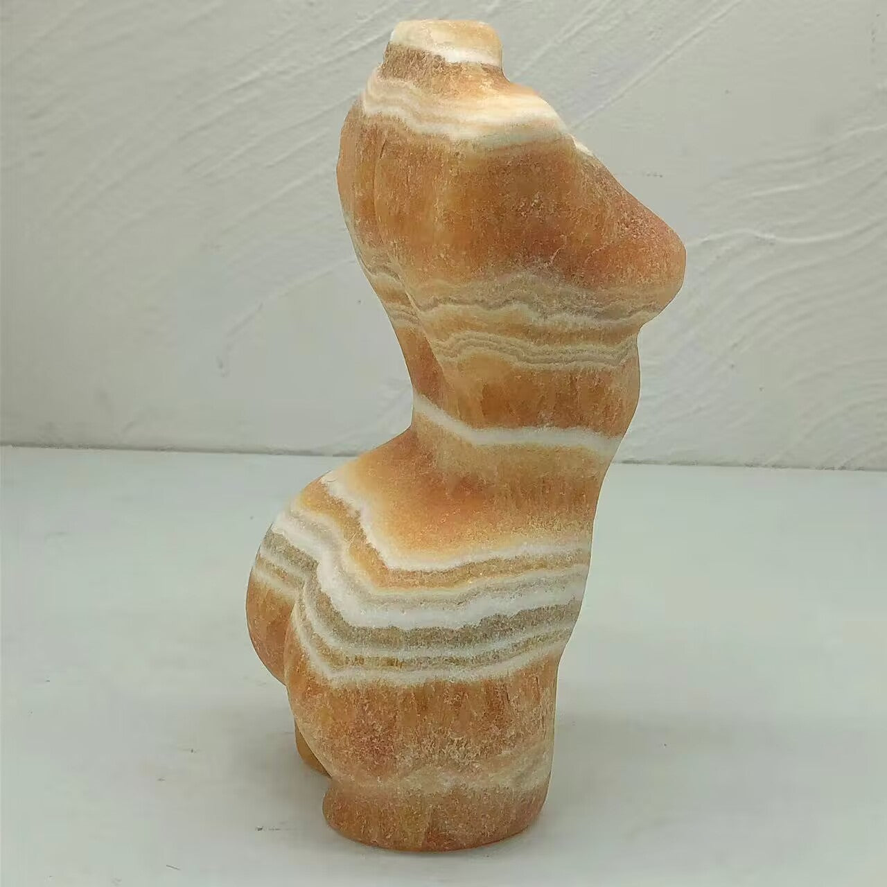 yellow calcite lady body carving