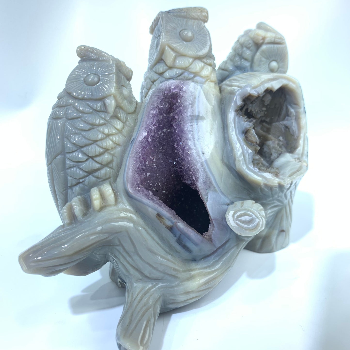 Amethyst cave carved with three owls